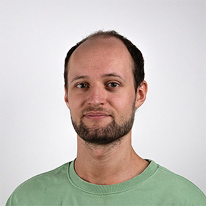 Young man with short hair and short beard